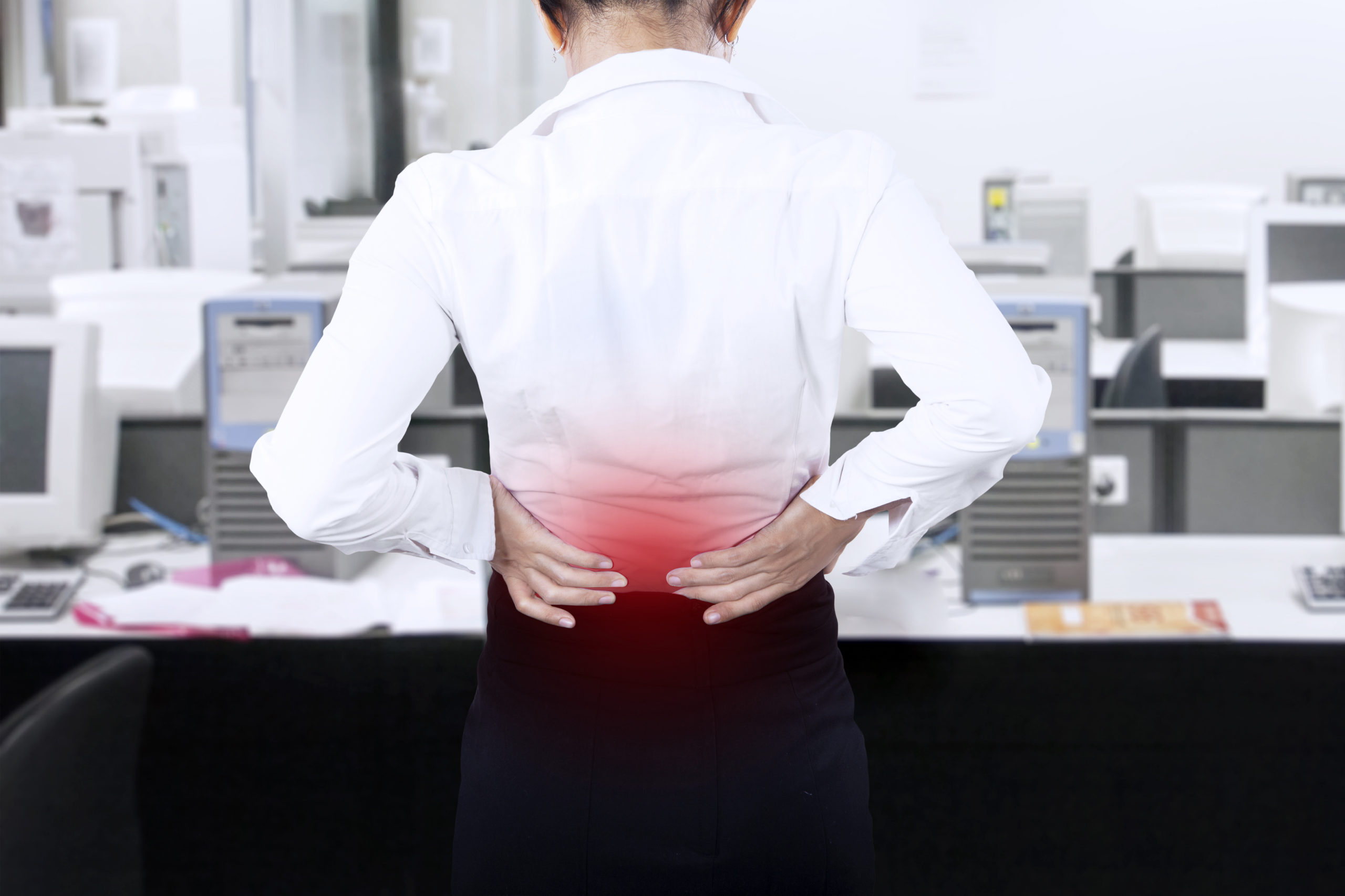Important Qualities to Look for in a Chiropractic Billing Service - Businesswoman having back pain at office