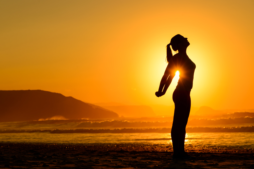 Choosing The Right Guardian For Your Children - Relaxing exercises on beach at sunset
